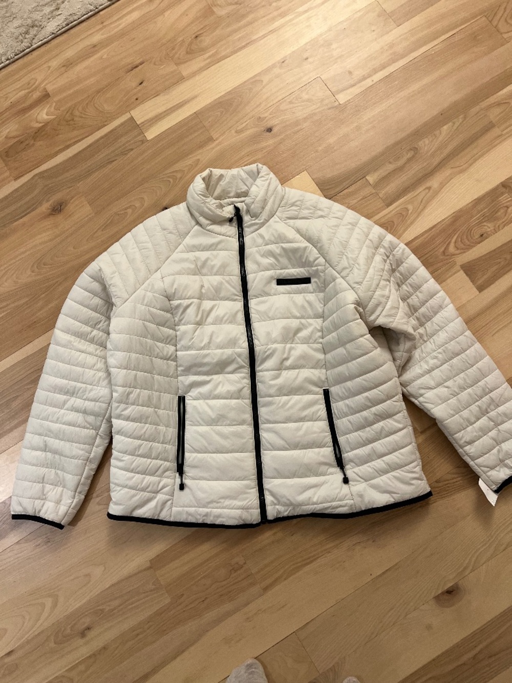 Merrill Lightweight Cream Puffer Jacket with Black Trim
